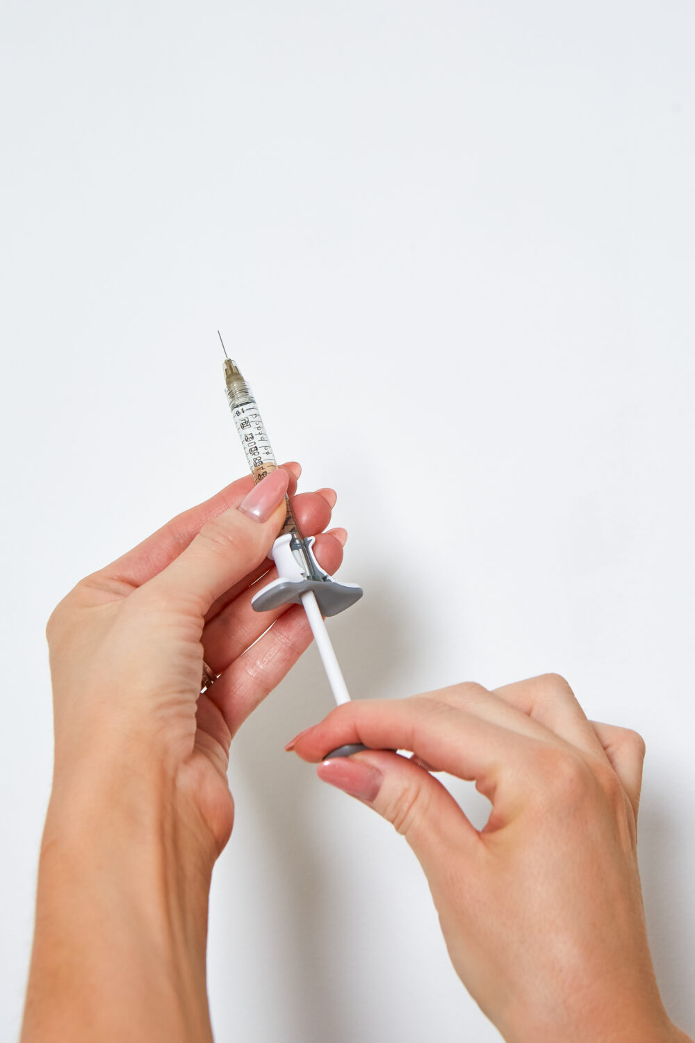 A needle injection for the Non-Surgical Rhinoplasty treatment with BU Aesthetics